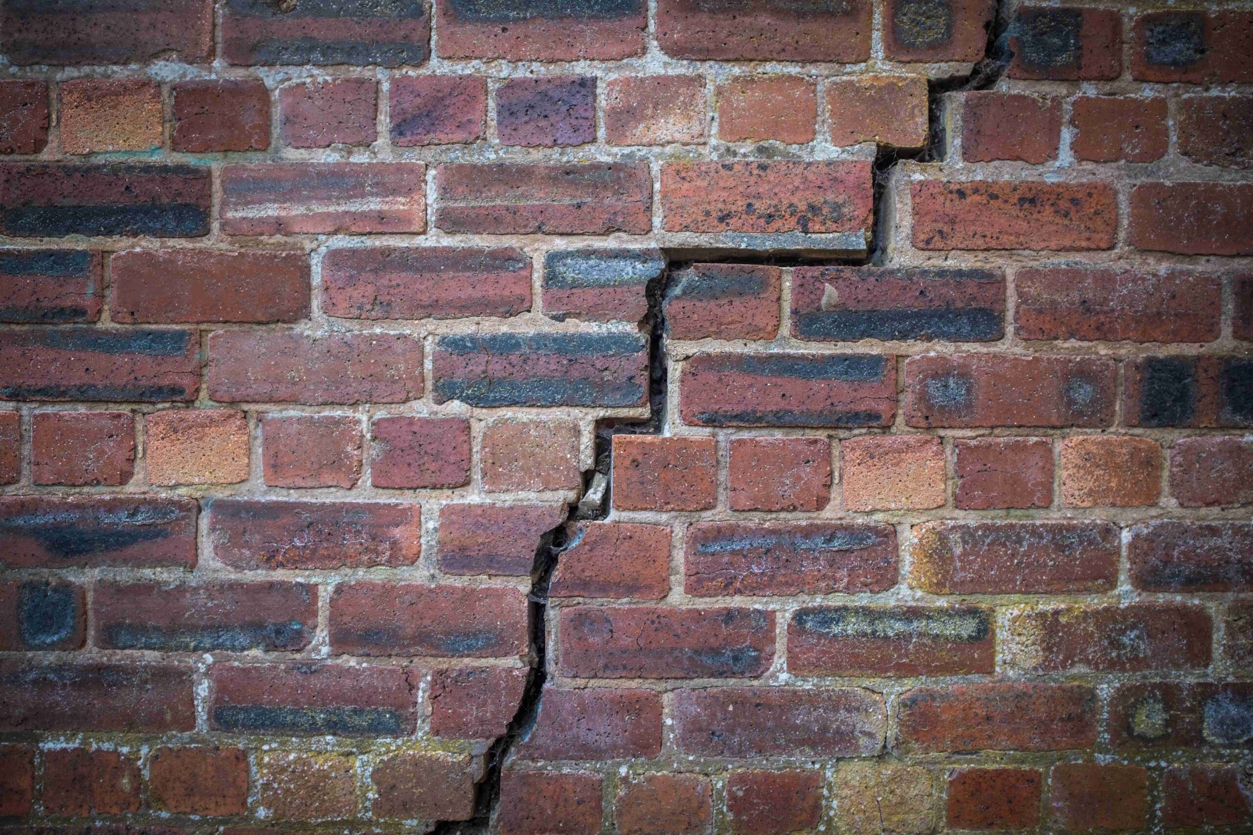 cracked-red-brick-wall-2021-08-30-04-16-45-utc (1)